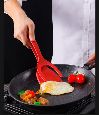 Prático clipe de comida 2 em 1 para colher ovos e virar bifes na culinária sustentável
